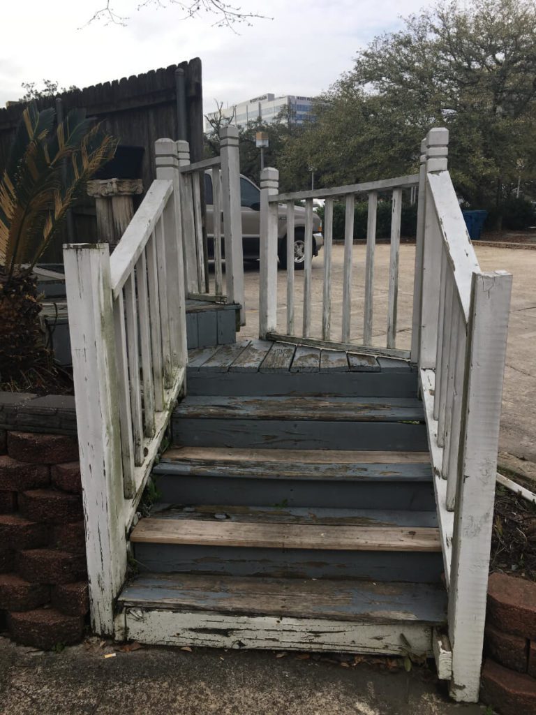 Before Historic Restoration and Renovation with front view of old entry stairs