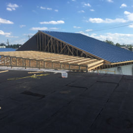 commercial-roof-repair-from-back-looking-to-front