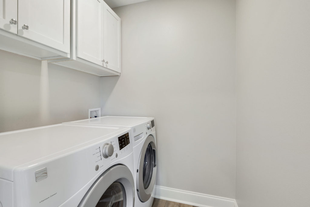 Baton Rouge Custom Home Builder with Living Space Laundry Room