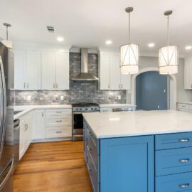 Home Remodel Kitchen Island dressed with pendant lighting