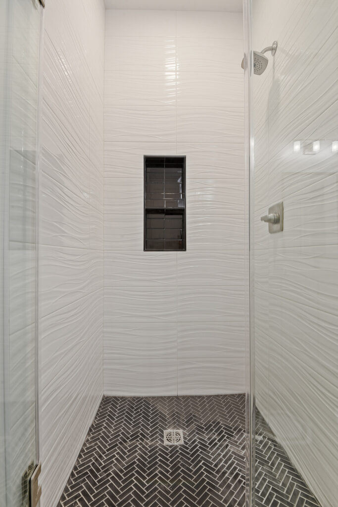 Duplex Home Builder shows master bathroom shower