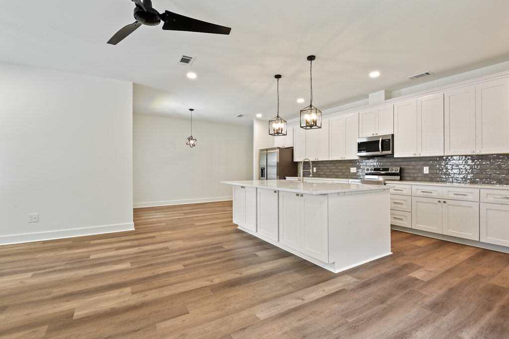 Duplex Home Builder open floor plan living area to kitchen